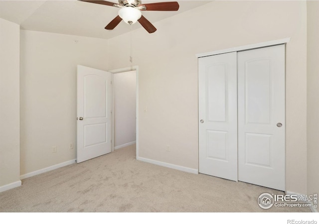 4905 Hahns Peak Dr Unit 202, Loveland, CO 80538 - unfurnished bedroom featuring carpet flooring, a closet, and a ceiling fan