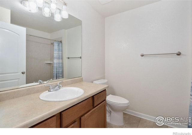 4905 Hahns Peak Dr Unit 202, Loveland, CO 80538 - full bath with vanity, tile patterned flooring, and curtained shower