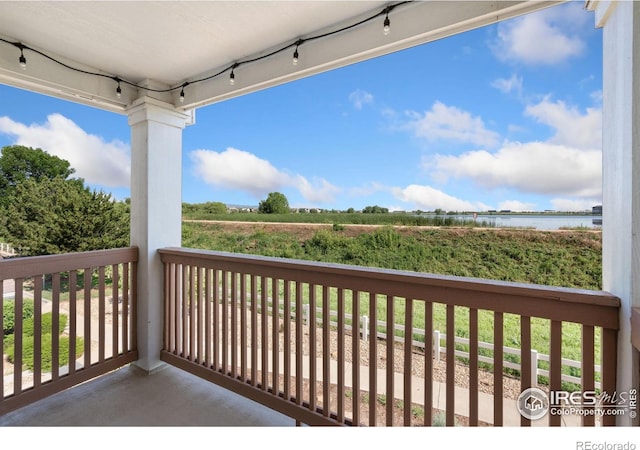 4905 Hahns Peak Dr Unit 202, Loveland, CO 80538 - balcony with a water view