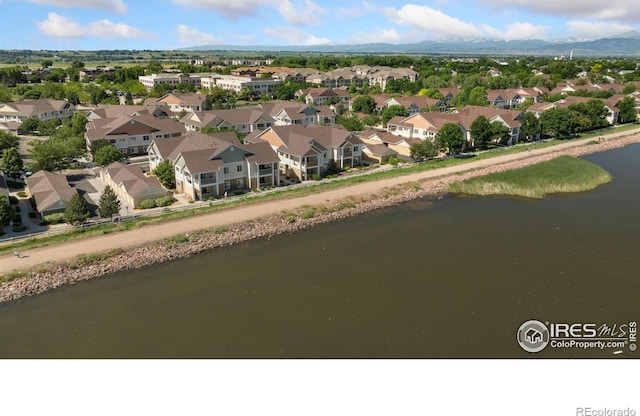 4905 Hahns Peak Dr Unit 202, Loveland, CO 80538 - aerial perspective of suburban area with a large body of water