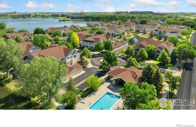 4905 Hahns Peak Dr Unit 202, Loveland, CO 80538 - aerial view of residential area with a nearby body of water and a pool area