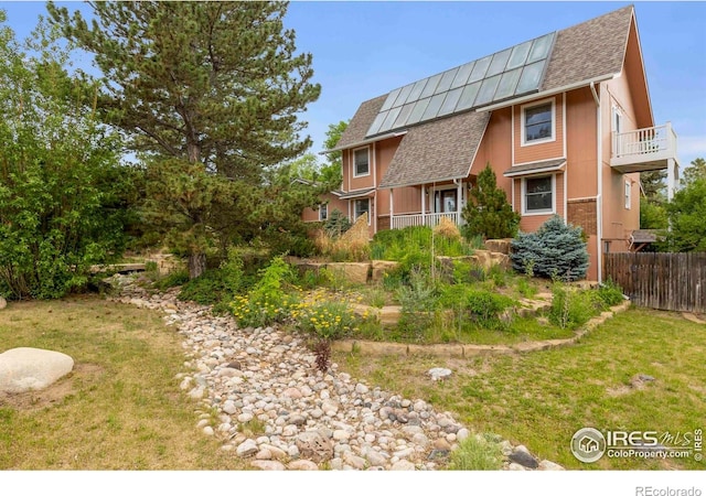 412 Terry Point Dr, Fort Collins, CO 80524 - back of house featuring a shingled roof