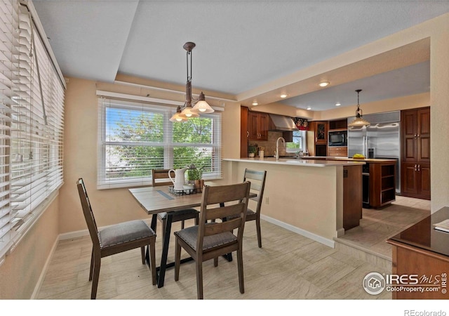 412 Terry Point Dr, Fort Collins, CO 80524 - dining space with a tray ceiling and recessed lighting