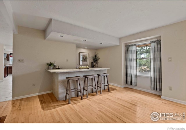412 Terry Point Dr, Fort Collins, CO 80524 - indoor bar with light wood-style flooring and baseboards