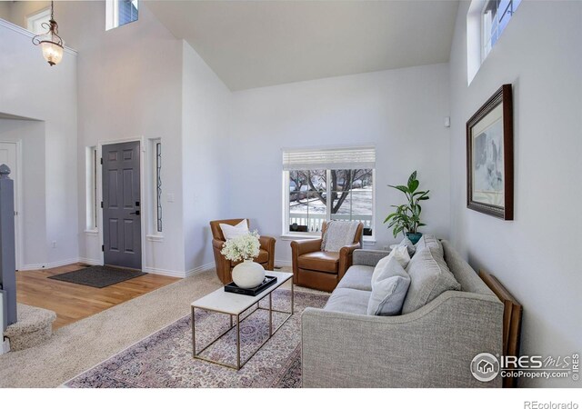 2547 Concord Cir, Lafayette, CO 80026 - living room with a towering ceiling and wood finished floors