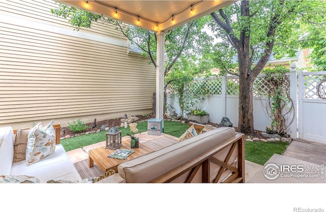 8367 Devinney St, Arvada, CO 80005 - view of patio featuring outdoor lounge area and a wooden deck