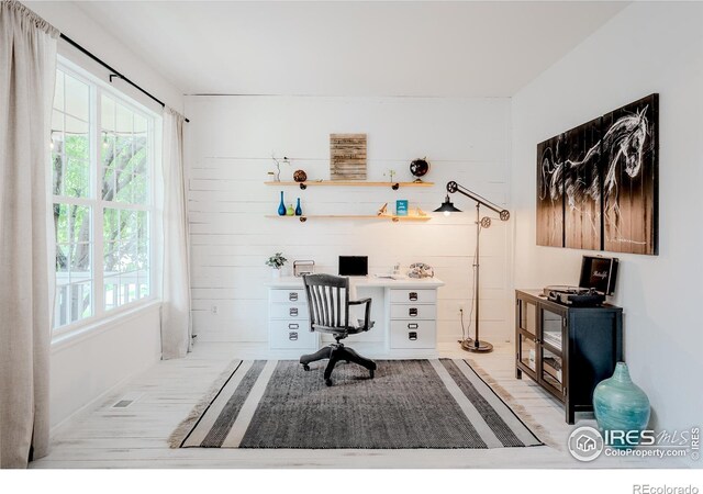 8367 Devinney St, Arvada, CO 80005 - office space with light wood-type flooring and wood walls