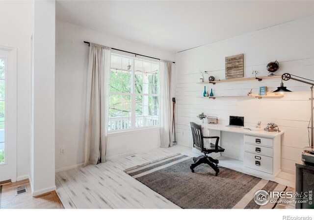 8367 Devinney St, Arvada, CO 80005 - office space featuring light wood-style floors