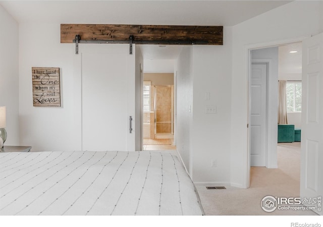 8367 Devinney St, Arvada, CO 80005 - unfurnished bedroom with beam ceiling, carpet floors, and ensuite bath