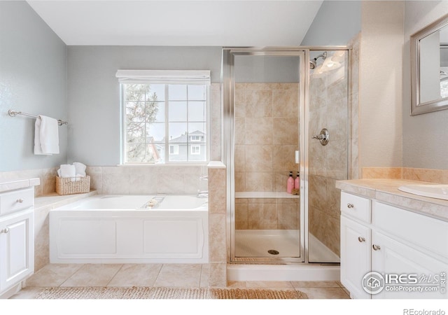 8367 Devinney St, Arvada, CO 80005 - full bath with vanity, a bath, a shower stall, and tile patterned flooring
