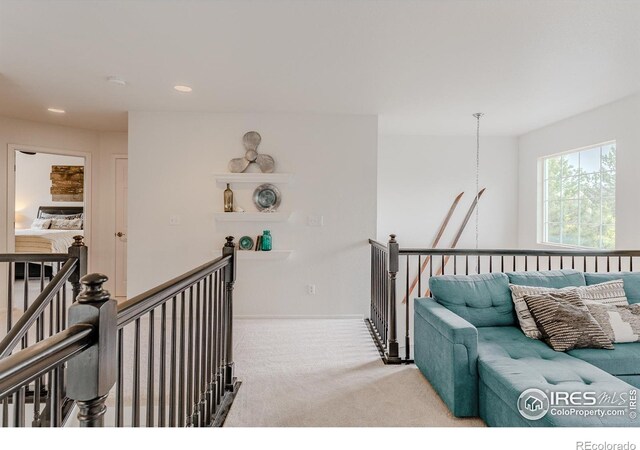 8367 Devinney St, Arvada, CO 80005 - carpeted living area featuring recessed lighting