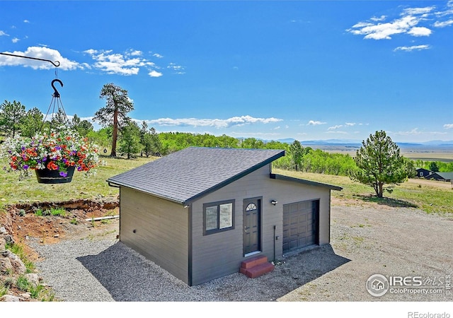 1424 Sheep Ridge Rd, Fairplay, CO 80440 - view of outbuilding featuring entry steps and a garage