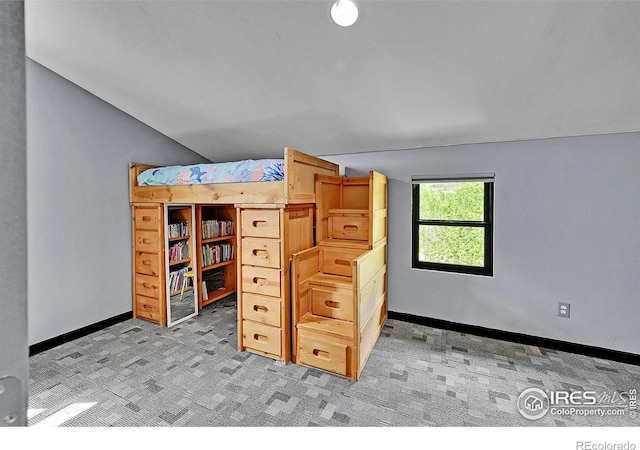 1424 Sheep Ridge Rd, Fairplay, CO 80440 - bedroom with lofted ceiling and light carpet