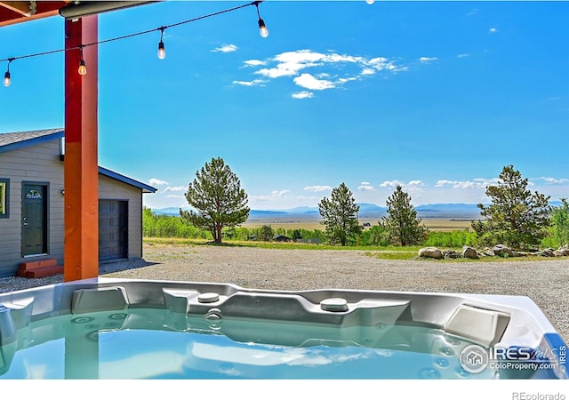 1424 Sheep Ridge Rd, Fairplay, CO 80440 - view of pool featuring a hot tub and a mountain view