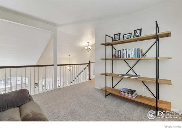2608 E 132nd Ave, Thornton, CO 80241 - living area featuring carpet and a chandelier