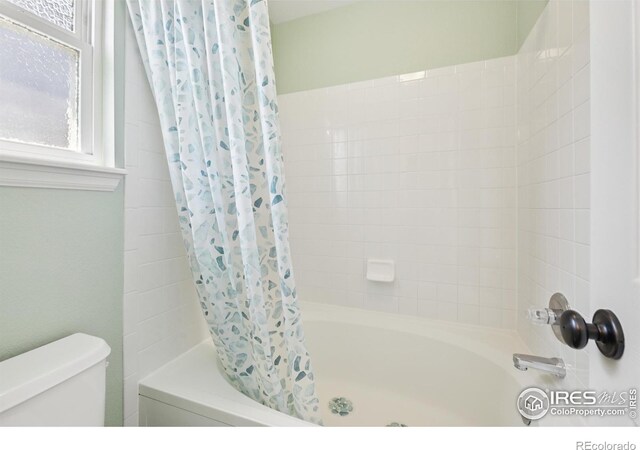2608 E 132nd Ave, Thornton, CO 80241 - full bathroom featuring toilet and shower / tub combo