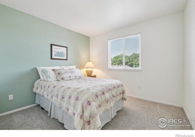 2608 E 132nd Ave, Thornton, CO 80241 - carpeted bedroom featuring baseboards