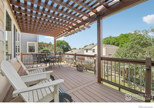 2608 E 132nd Ave, Thornton, CO 80241 - wooden terrace featuring outdoor dining area and a pergola