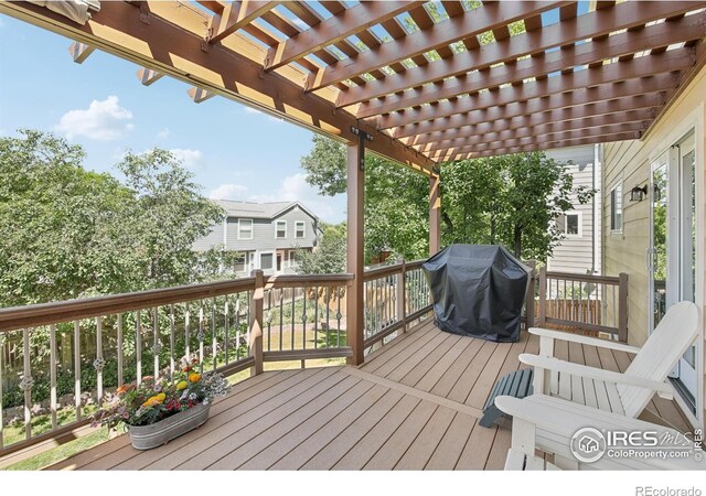 2608 E 132nd Ave, Thornton, CO 80241 - wooden terrace with grilling area and a pergola