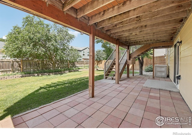2608 E 132nd Ave, Thornton, CO 80241 - fenced backyard featuring a patio area and stairs