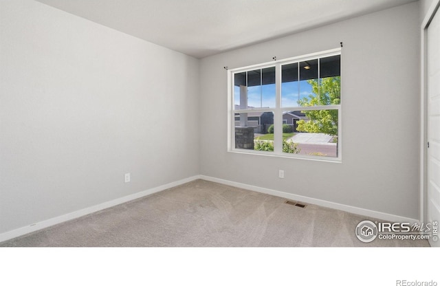 627 Overland Trl, Ault, CO 80610 - carpeted empty room with baseboards
