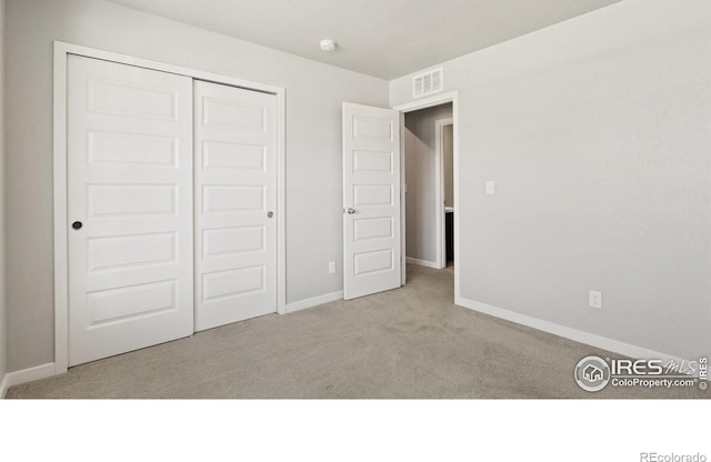 627 Overland Trl, Ault, CO 80610 - unfurnished bedroom with carpet and a closet