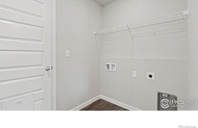 627 Overland Trl, Ault, CO 80610 - laundry area with hookup for a washing machine, electric dryer hookup, and dark wood-type flooring