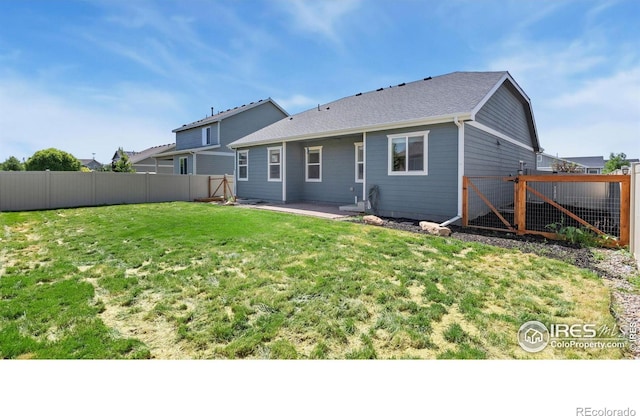 627 Overland Trl, Ault, CO 80610 - back of property featuring a fenced backyard