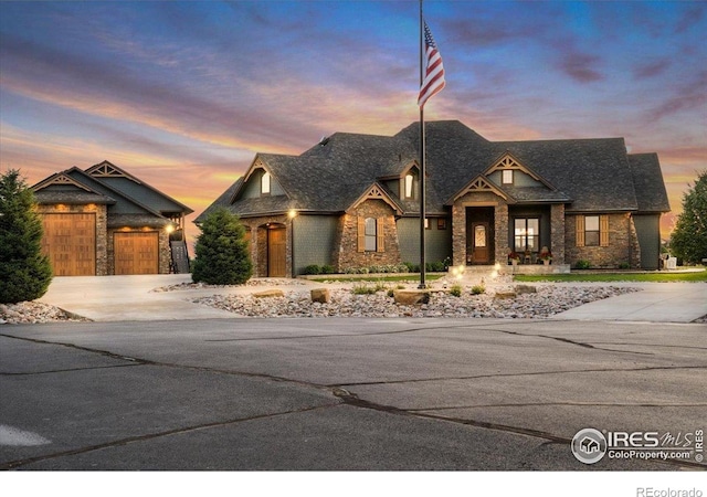 37021 Kingfisher Ct, Severance, CO 80550 - view of front of home featuring driveway and brick siding