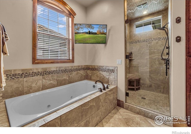 37021 Kingfisher Ct, Severance, CO 80550 - full bath featuring a shower stall and a jetted tub