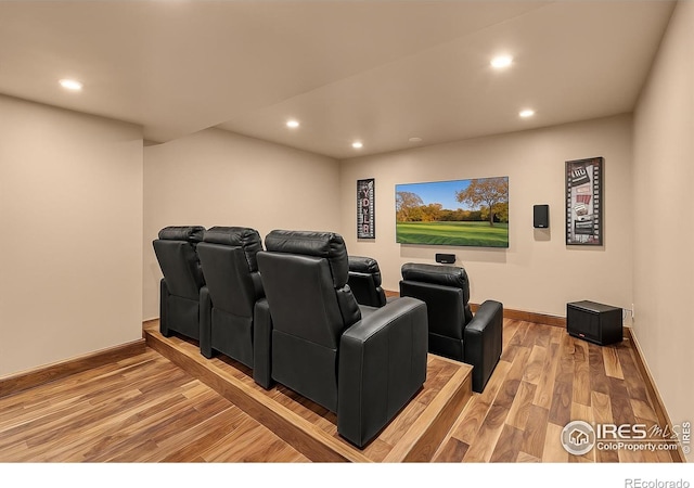 37021 Kingfisher Ct, Severance, CO 80550 - home theater room with recessed lighting and light wood-style flooring
