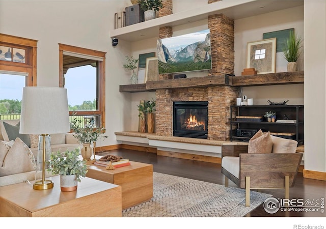 863 Riparian Way, Fort Collins, CO 80524 - living area with wood finished floors and a stone fireplace