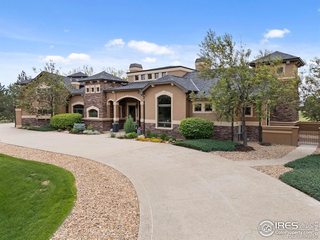 863 Riparian Way, Fort Collins, CO 80524 - view of front of property featuring stone siding and stucco siding
