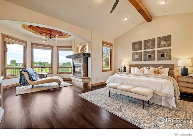 863 Riparian Way, Fort Collins, CO 80524 - bedroom featuring wood finished floors, a stone fireplace, recessed lighting, and a chandelier