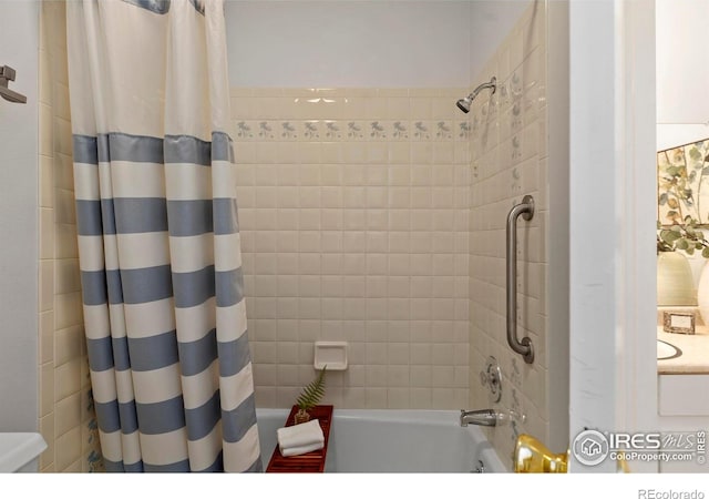 705 E Drake Rd Unit 40, Fort Collins, CO 80525 - bathroom featuring shower / bath combo with shower curtain