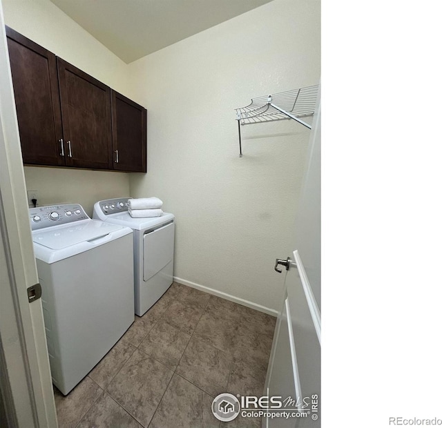 306 Baja Dr, Windsor, CO 80550 - laundry room with independent washer and dryer, cabinet space, and light tile patterned flooring