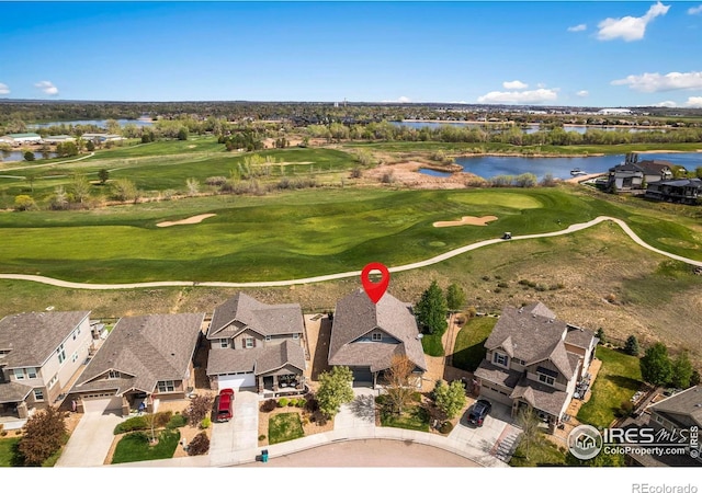 306 Baja Dr, Windsor, CO 80550 - aerial perspective of suburban area with a nearby body of water and a local golf course