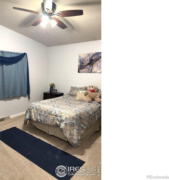 3200 Claremont Ave, Evans, CO 80620 - carpeted bedroom featuring baseboards and ceiling fan
