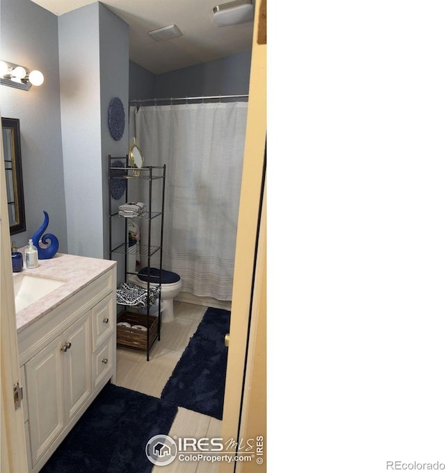3200 Claremont Ave, Evans, CO 80620 - full bath with vanity and toilet