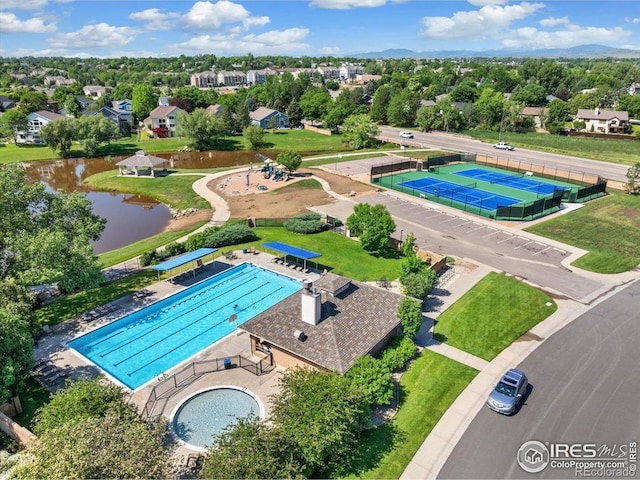 1206 Canvasback Ct, Fort Collins, CO 80525 - drone / aerial view of a pool and a nearby body of water