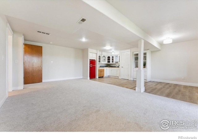 1206 Canvasback Ct, Fort Collins, CO 80525 - finished basement with light colored carpet and baseboards
