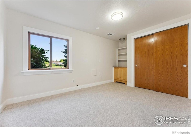 1206 Canvasback Ct, Fort Collins, CO 80525 - unfurnished bedroom featuring carpet and a closet