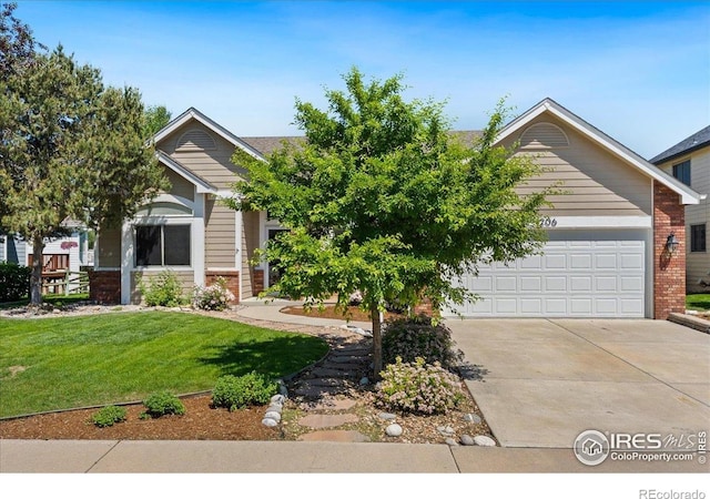 1206 Canvasback Ct, Fort Collins, CO 80525 - view of property hidden behind natural elements with driveway, a front lawn, an attached garage, and brick siding