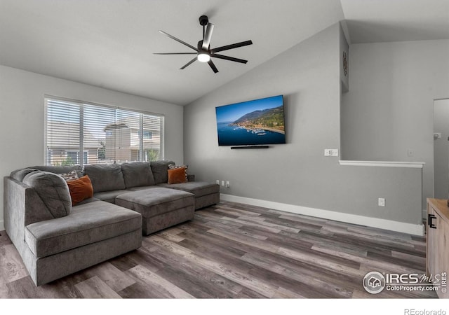 452 Mt Sherman Ave, Severance, CO 80550 - living area with vaulted ceiling, wood finished floors, and a ceiling fan