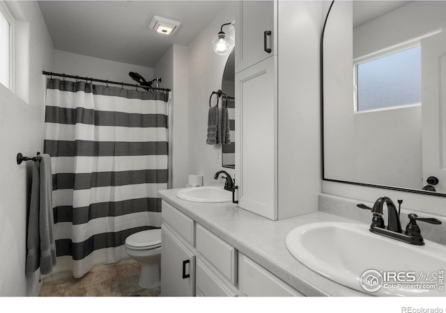 452 Mt Sherman Ave, Severance, CO 80550 - bathroom with double vanity and curtained shower