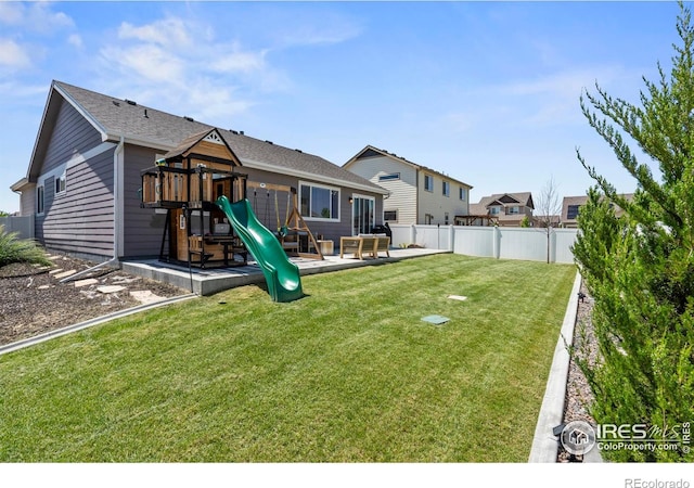 452 Mt Sherman Ave, Severance, CO 80550 - rear view of house featuring a playground