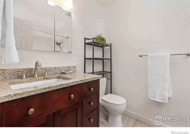 7261 Mount Meeker Rd, Longmont, CO 80503 - bathroom featuring vanity and toilet