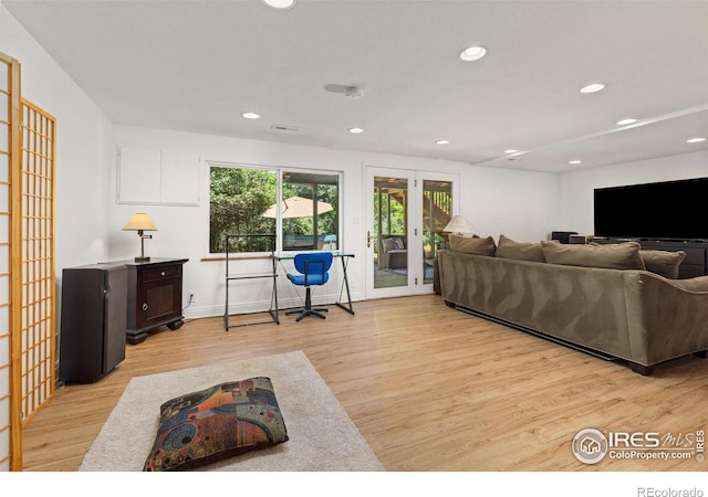 7261 Mount Meeker Rd, Longmont, CO 80503 - living area featuring french doors, light wood-type flooring, and recessed lighting