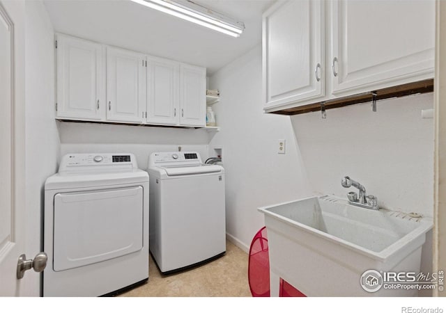 7261 Mount Meeker Rd, Longmont, CO 80503 - washroom featuring cabinet space and independent washer and dryer