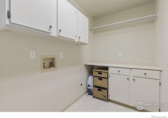 7261 Mount Meeker Rd, Longmont, CO 80503 - washroom with cabinet space, washer hookup, and light floors